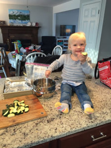 Zoey helping in the kitchen