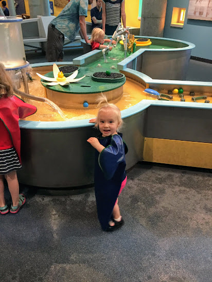 Zoey at the Denver Nature and Science Museum playing water