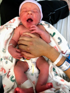 William yawning in his diaper at the hospital