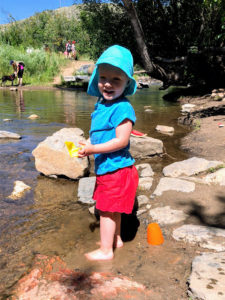 Zoey at the river playing in the water