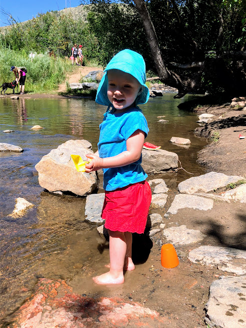 Zoey at the river playing in the water