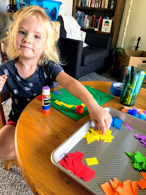 Girl making mosaic craft for  29 beginner craft projects for young kids