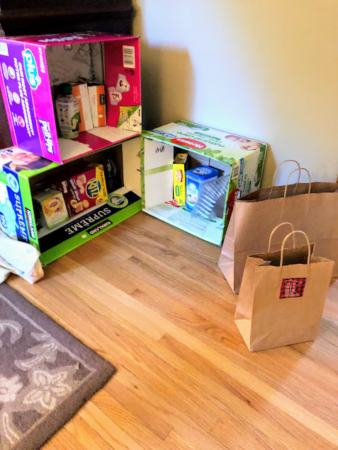 Recycled boxes in grocery store for no screen activities for kids