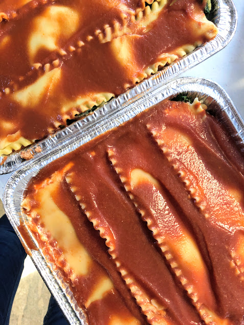 Lasagna in a pan ready for the freezer for healthy ingredient swaps for dinners