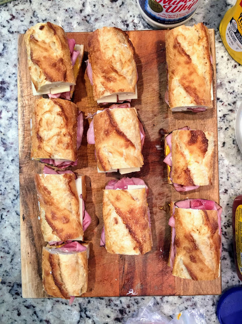 ham and cheese sandwiches on sliced baguettes for a new mom freezer meal option