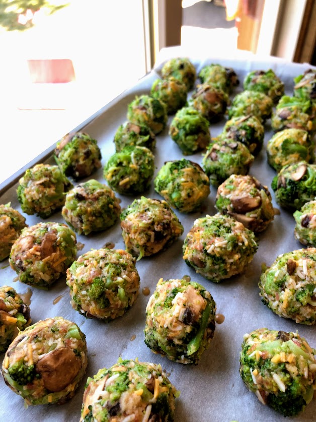baking pan with precooked broccoli bites