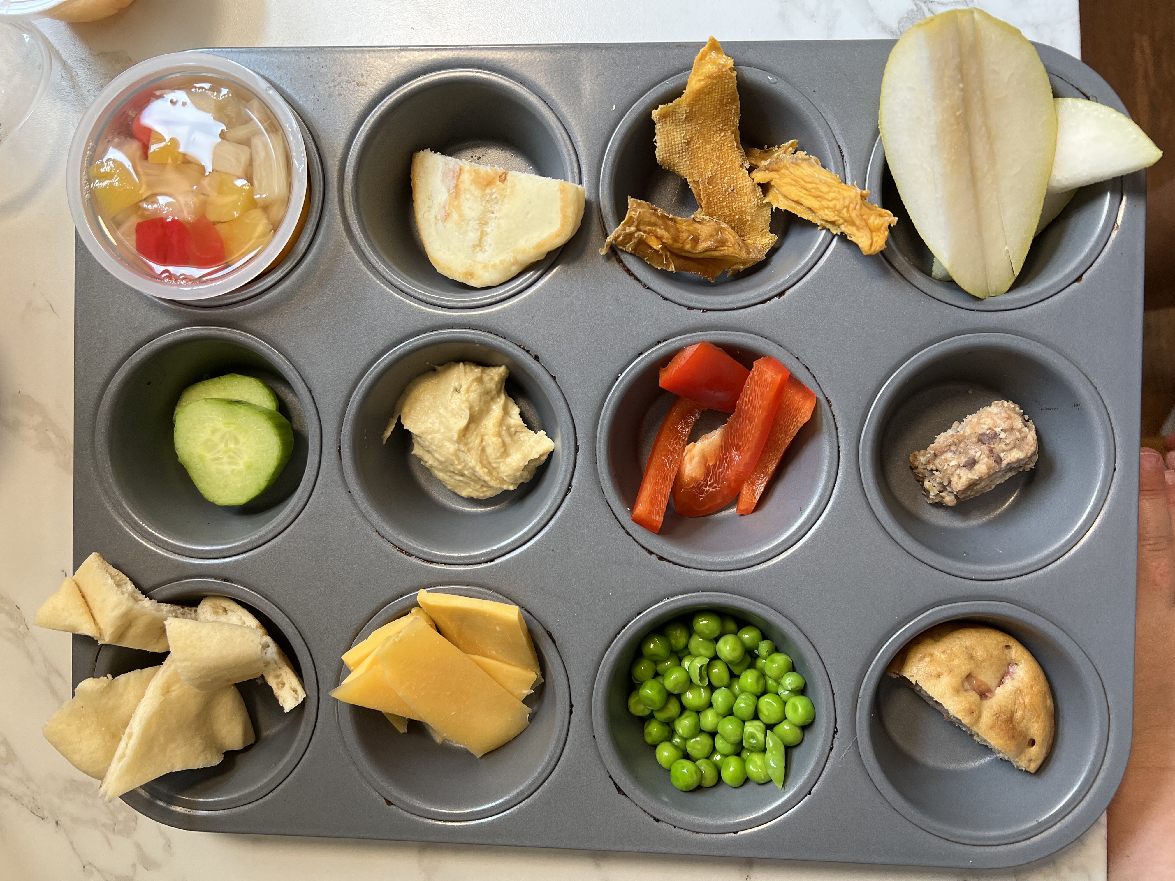 Muffin pan meal example for a toddler