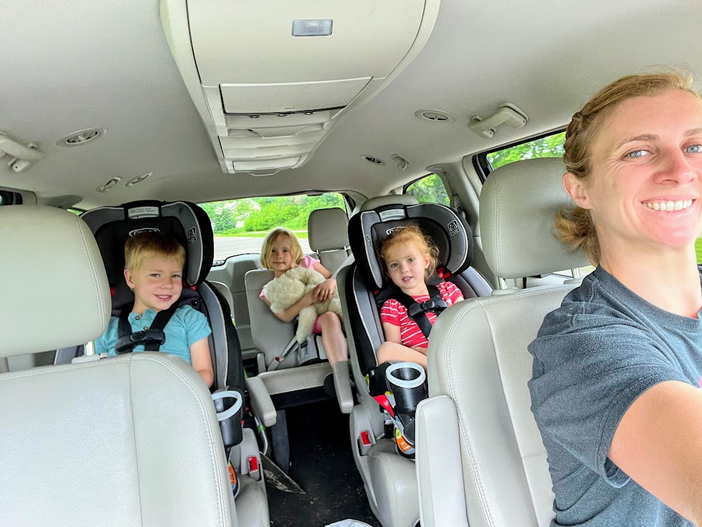 Stay at home mom and kids in the car