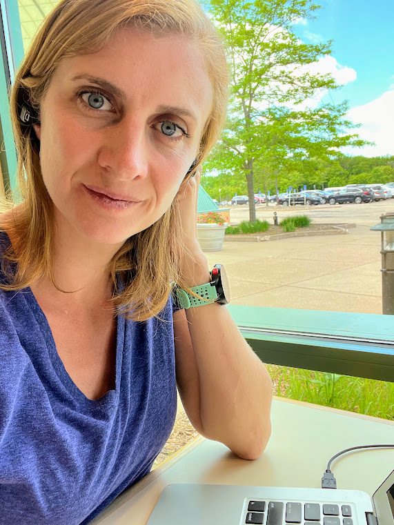 Stay at home mom on work break looking at camera