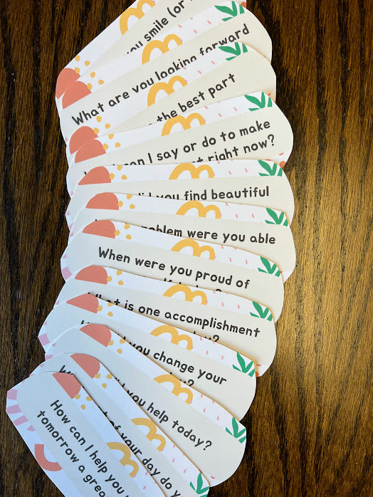 printed and cut cards in a fan line
