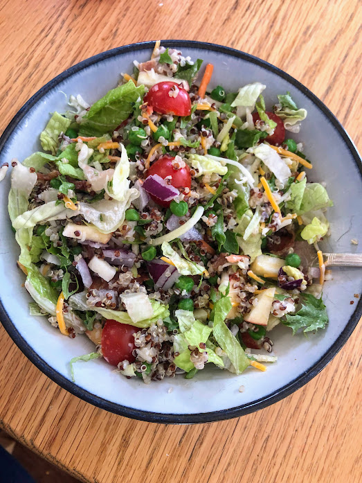 kale salad with tomatoes and dressing
